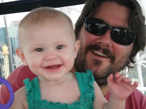 Sitting with Daddy on the SkyWheel at Niagra Falls.